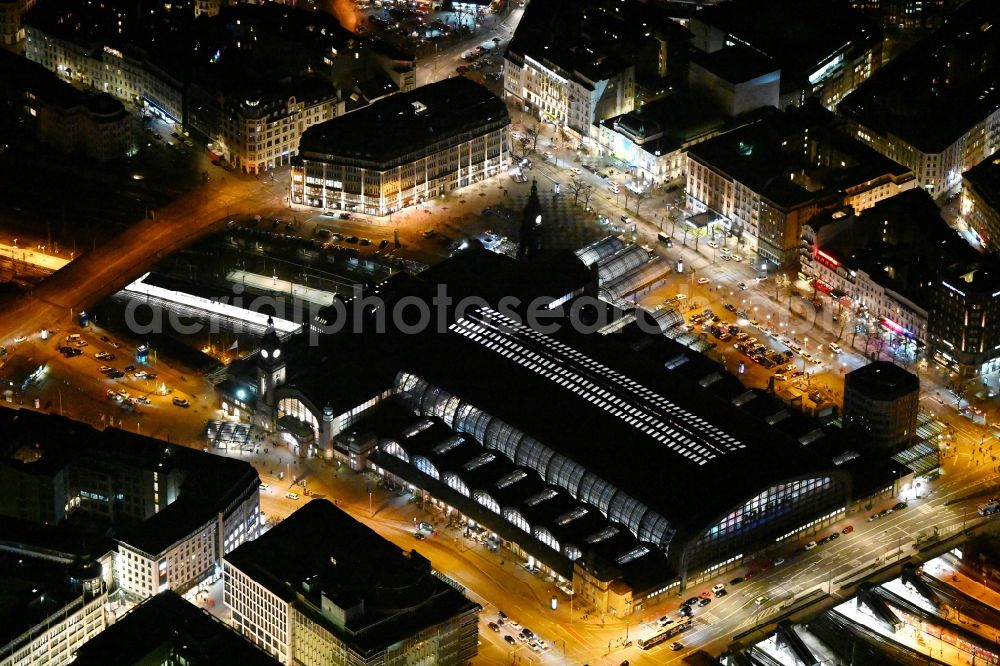 Aerial image at night Hamburg - Night lighting track progress and building of the main station of the railway in the district Sankt Georgen in Hamburg, Germany