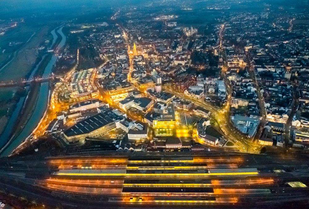 Aerial image at night Hamm - Night lighting Building of the main train station of Deutsche Bahn on Willy-Brandt-Platz in Hamm in the Ruhr area in the state of North Rhine-Westphalia, Germany