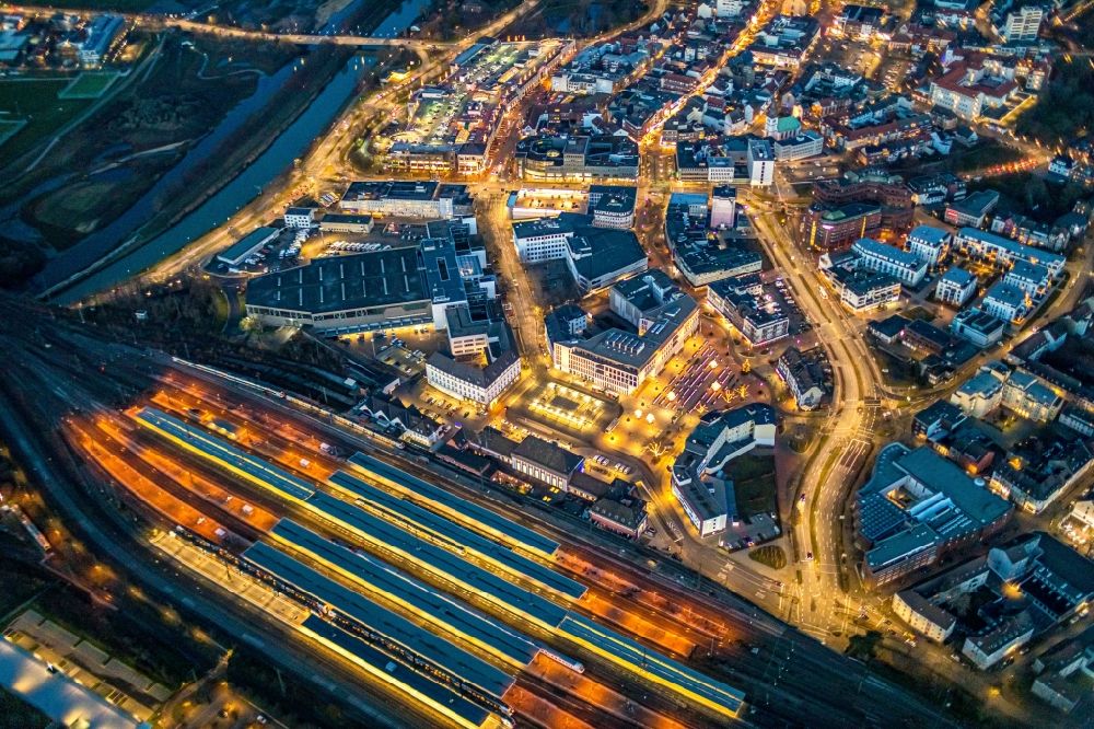 Aerial image at night Hamm - Night lighting track progress and building of the main station of the railway in Hamm in the state North Rhine-Westphalia, Germany