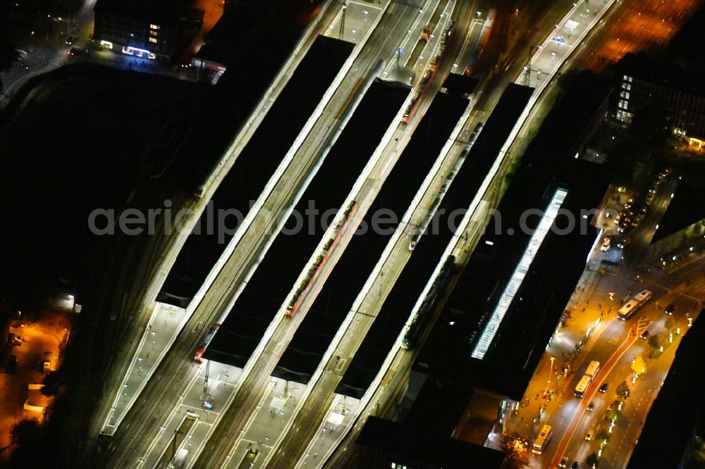 Münster at night from above - Night lighting Track progress and building of the main station of the railway in Muenster in the state North Rhine-Westphalia, Germany