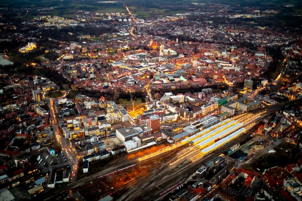 Aerial image at night Münster - Night lighting Track progress and building of the main station of the railway in Muenster in the state North Rhine-Westphalia, Germany