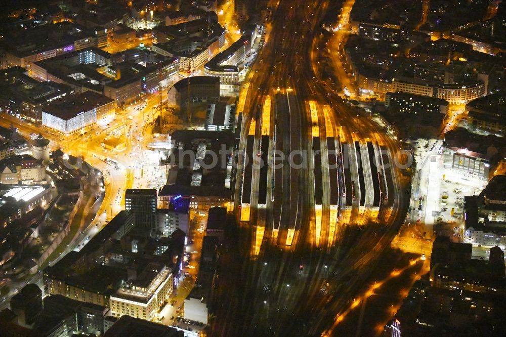 Aerial image at night Nürnberg - Night lighting Track progress and building of the main station of the railway in the district Tafelhof in Nuremberg in the state Bavaria, Germany