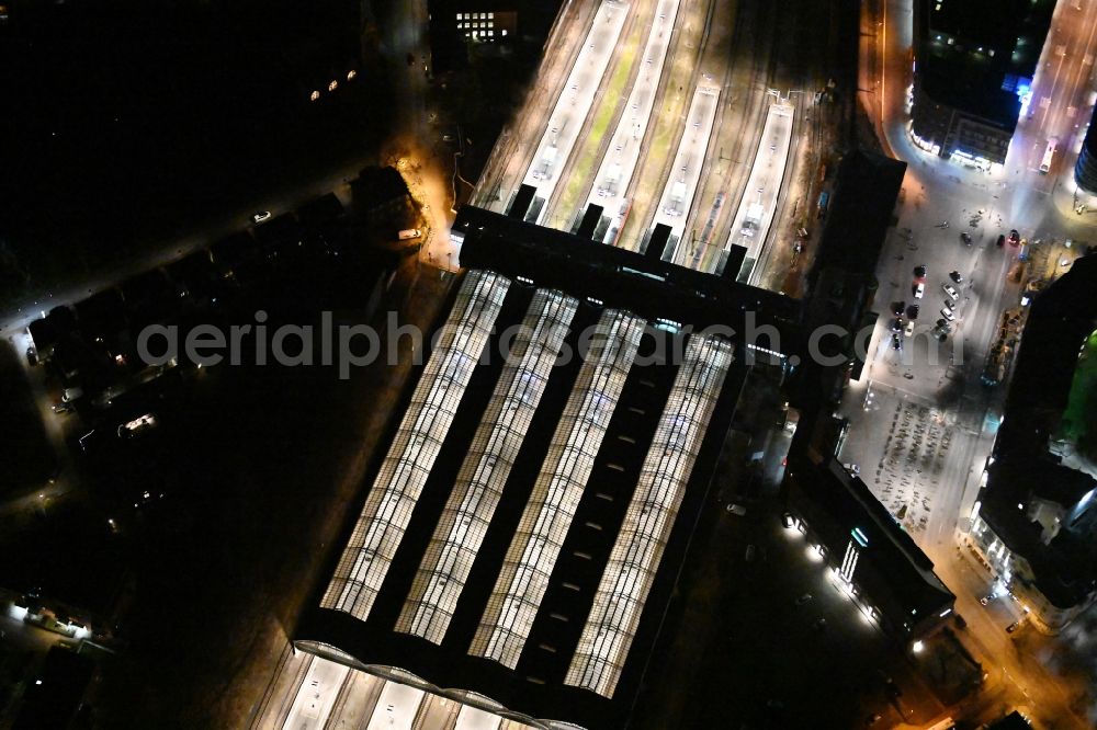 Lübeck at night from above - Night lighting main station of the railway in the district Sankt Lorenz Sued in Luebeck in the state Schleswig-Holstein
