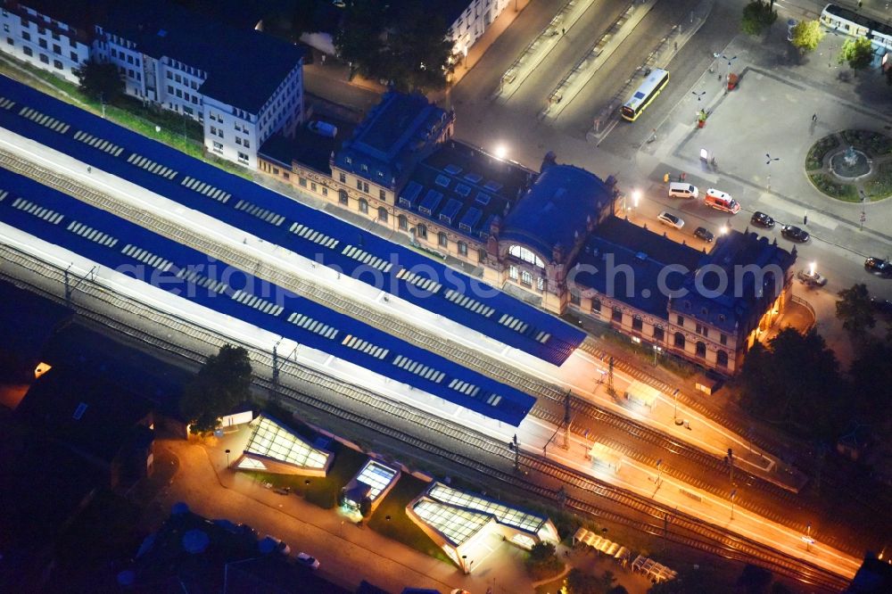 Schwerin at night from above - Night lighting Track progress and building of the main station of the railway in Schwerin in the state Mecklenburg - Western Pomerania, Germany