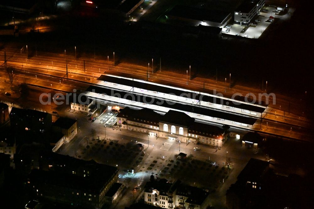 Weimar at night from the bird perspective: Night lighting Track progress and building of the main station of the railway in Weimar in the state Thuringia, Germany