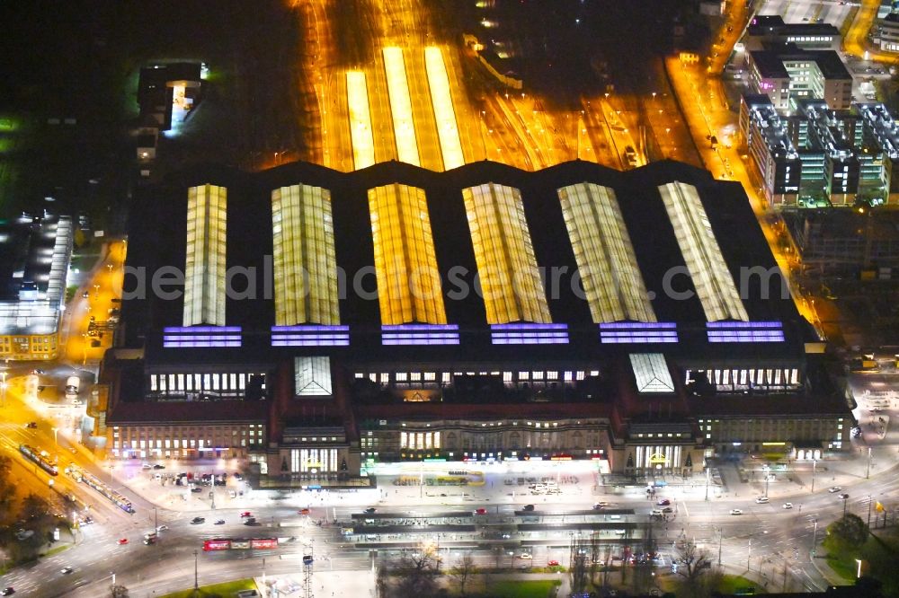 Aerial image at night Leipzig - Night lighting view over the building of the main station in Leipzig in Saxony