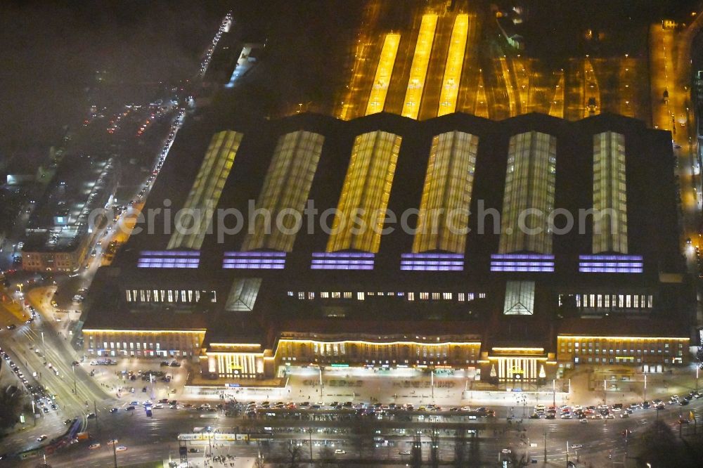 Aerial photograph at night Leipzig - Night lighting view over the building of the main station in Leipzig in Saxony