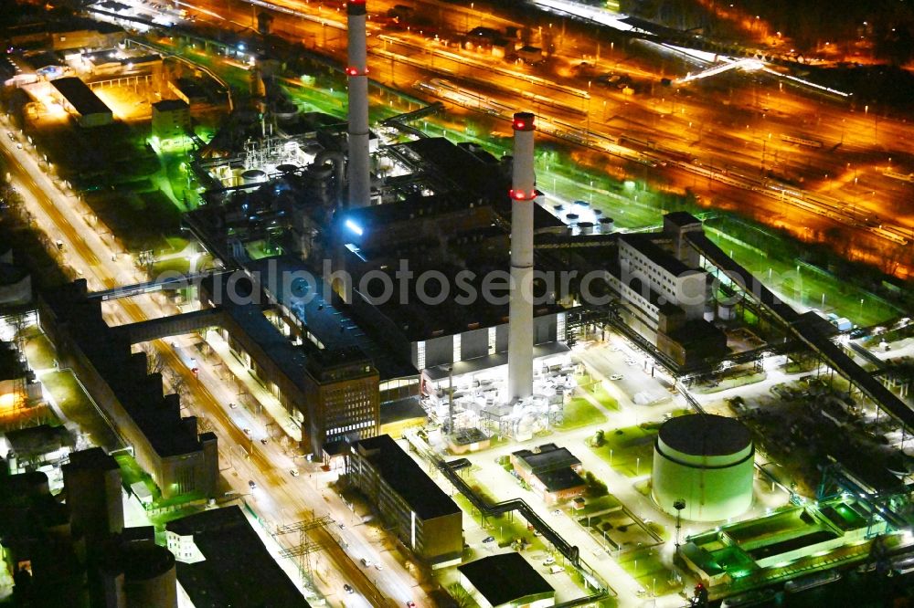 Aerial photograph at night Berlin - Night lighting combined heat and power station plant Klingenberg on Koepenicker Chaussee in Berlin-Rummelsburg