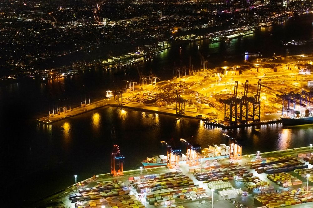 Aerial image at night Hamburg - Night lighting hHLA Logistics Container Terminal Burchardkai in the Port of Hamburg harbor in Hamburg in Germany