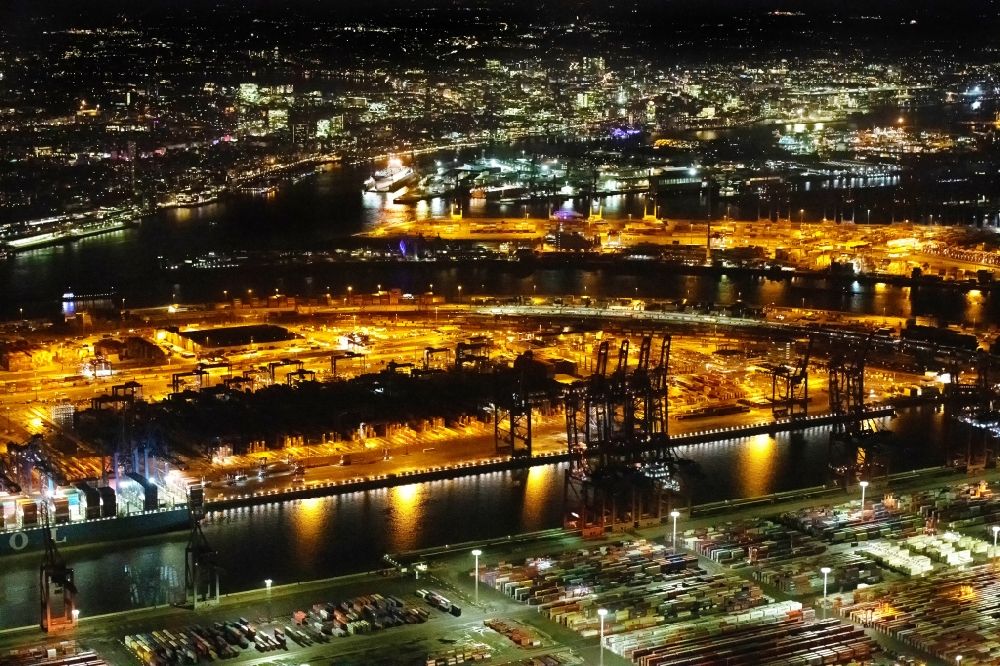 Aerial photograph at night Hamburg - Night lighting hHLA Logistics Container Terminal Burchardkai in the Port of Hamburg harbor in Hamburg in Germany