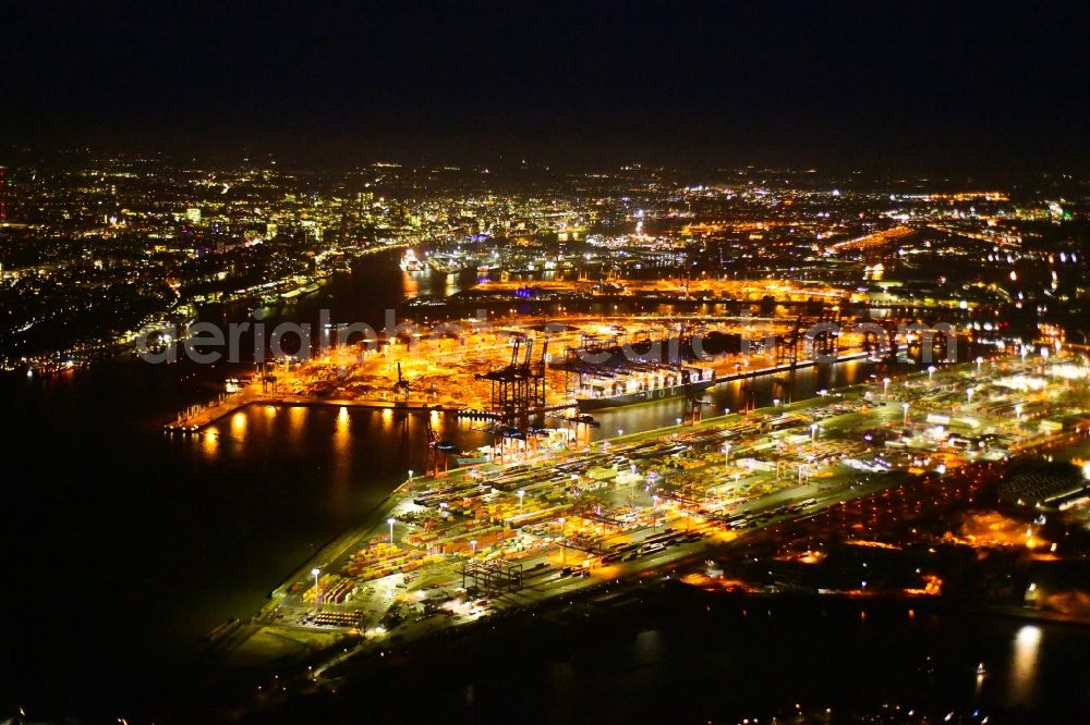 Aerial photograph at night Hamburg - Night lighting hHLA Logistics Container Terminal Burchardkai in the Port of Hamburg harbor in Hamburg in Germany