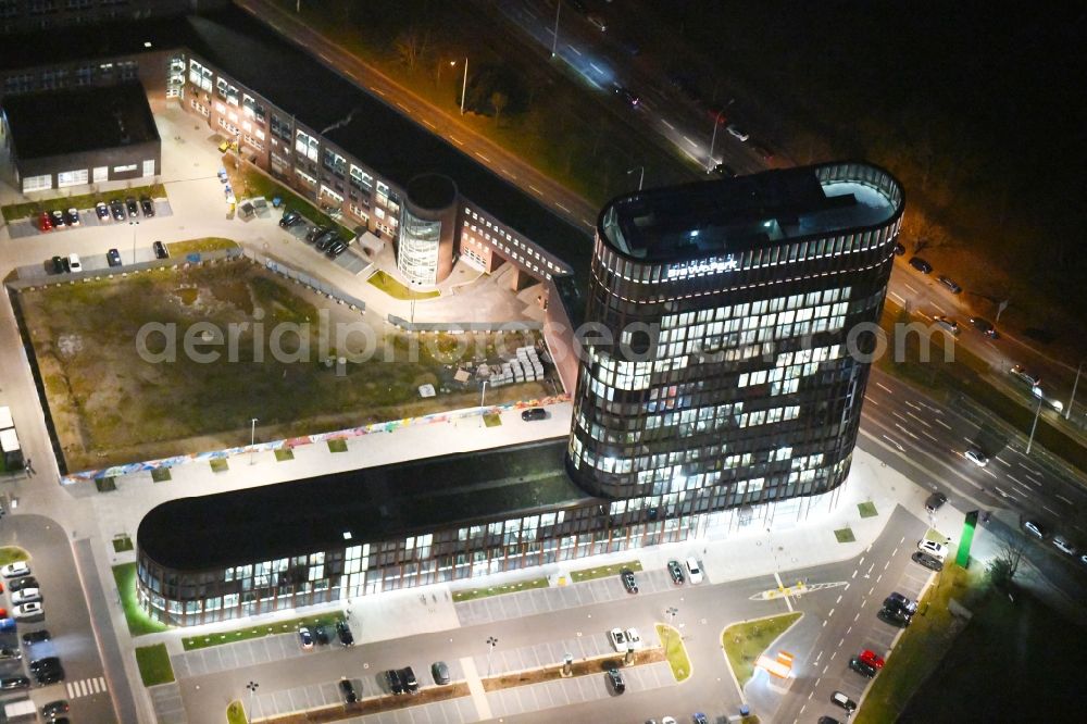 Aerial photograph at night Braunschweig - Night lighting Building of the skyscraper at BRAWOPARK of the Volksbank in Braunschweig in the state Lower Saxony