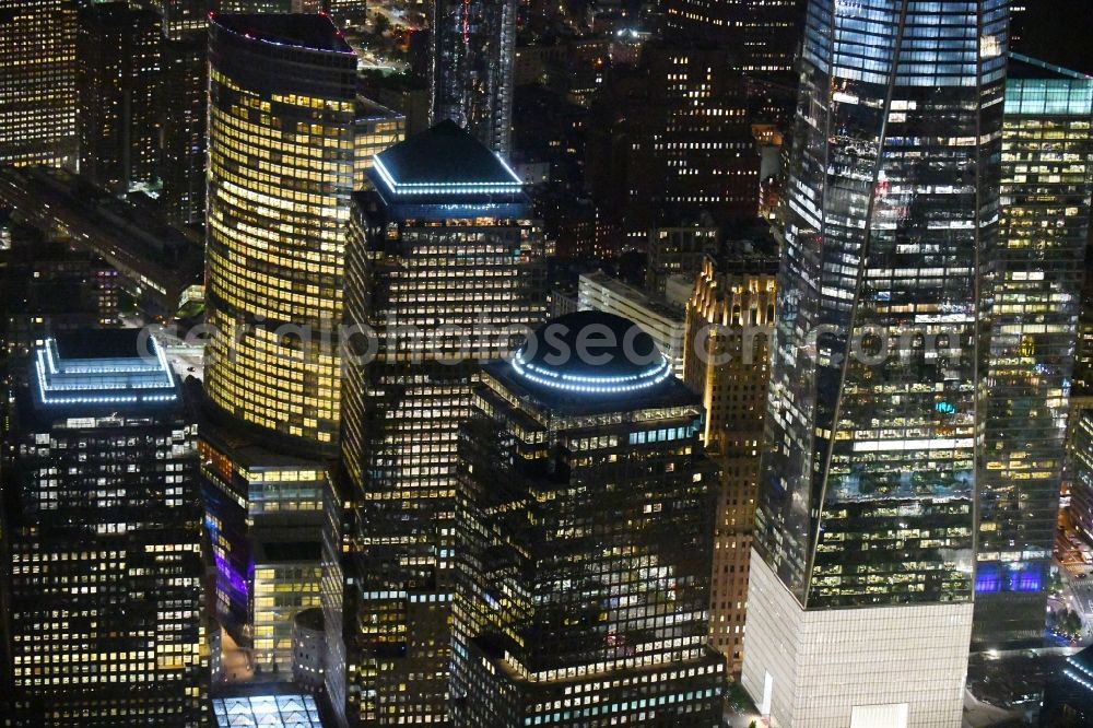 Aerial photograph at night New York - Night lighting High-rise ensemble of West St - Brookfield Place in the district Manhattan in New York in United States of America
