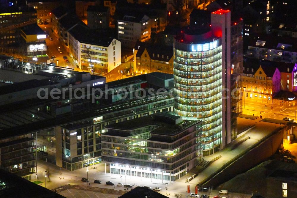 Aerial photograph at night Stuttgart - Night lighting high-rise skyscraper building and bank administration of the financial services company Landesbank Baden-Wuerttemberg on Heilbronner Strasse - Osloer Strasse - Warschauer Strasse in the district Europaviertel in Stuttgart in the state Baden-Wurttemberg, Germany