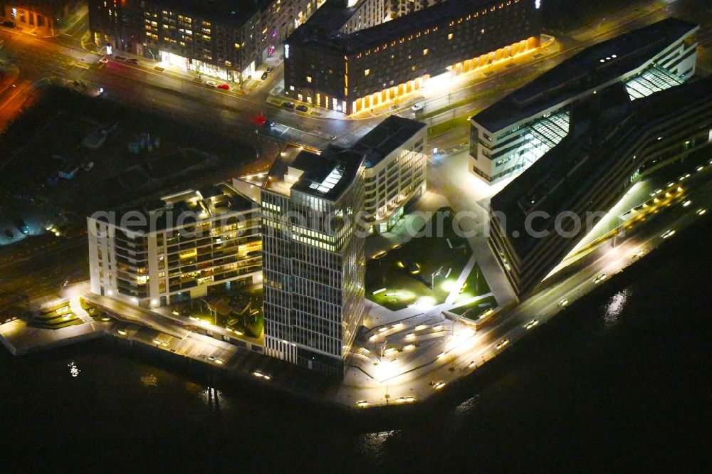 Hamburg at night from above - Night lighting build a new office and commercial building Intelligent Quarters in of Hafen City in Hamburg, Germany