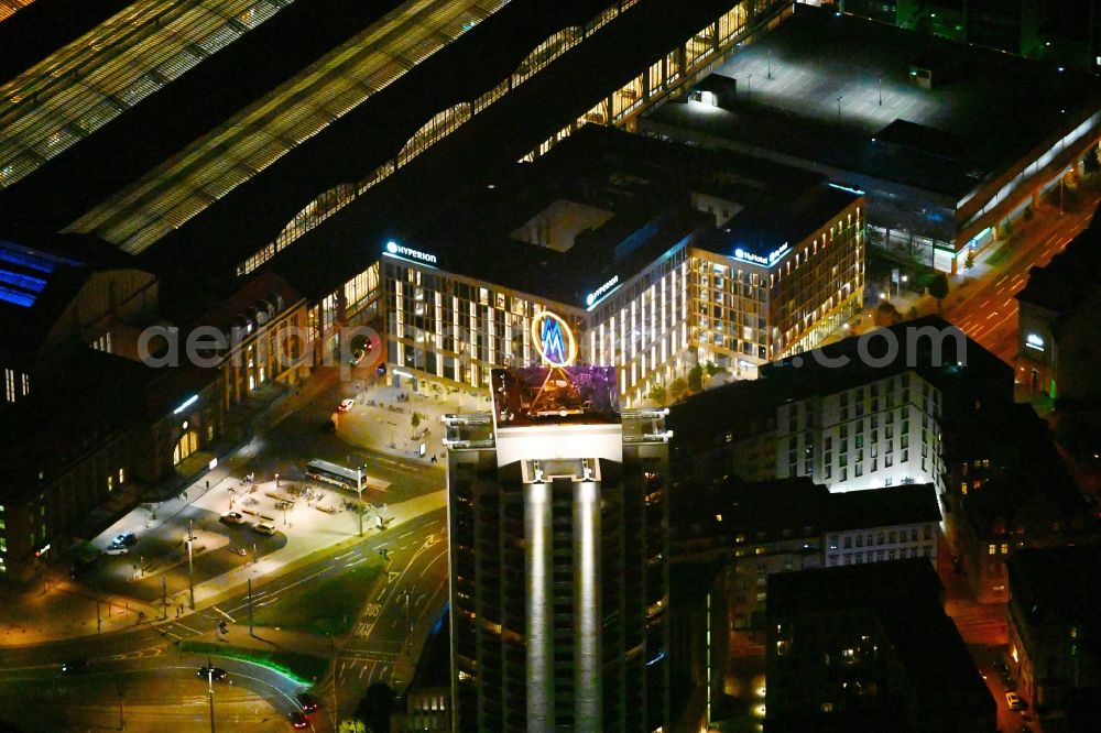 Leipzig at night from the bird perspective: Night lighting hotel complex of H-Hotels AG in Leipzig in the state Saxony, Germany