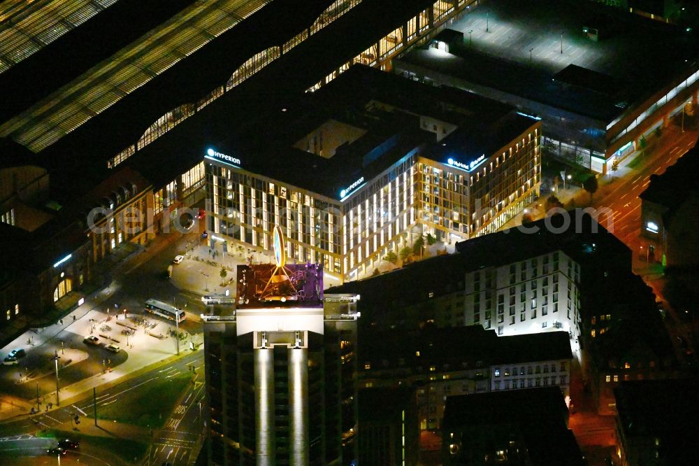 Aerial photograph at night Leipzig - Night lighting hotel complex of H-Hotels AG in Leipzig in the state Saxony, Germany