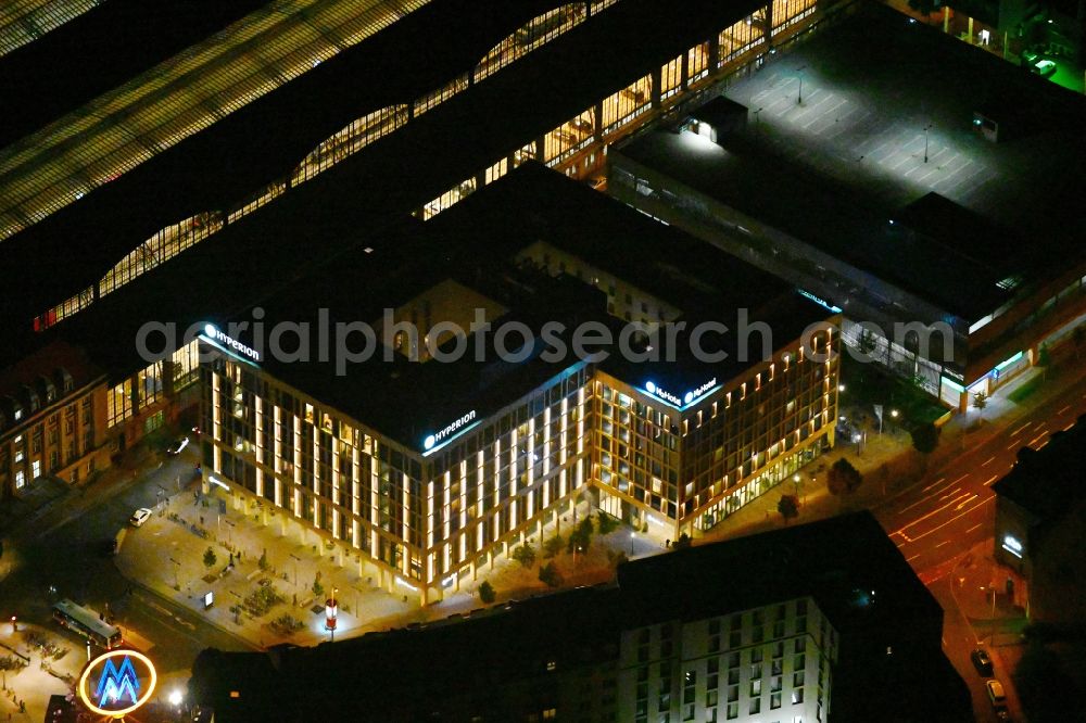 Leipzig at night from above - Night lighting hotel complex of H-Hotels AG in Leipzig in the state Saxony, Germany