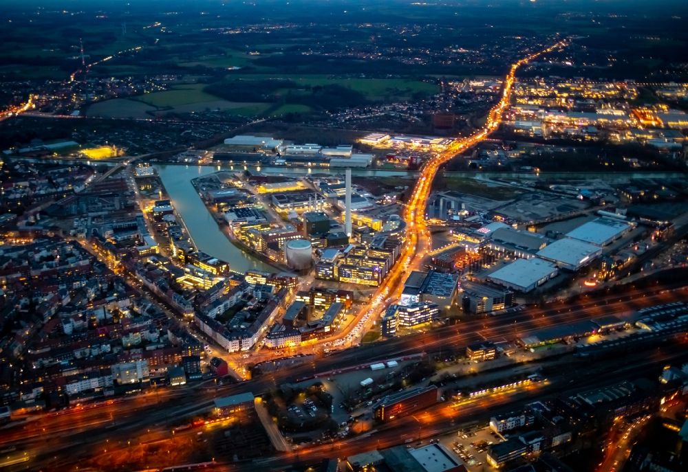 Aerial photograph at night Münster - Night lighting industrial and commercial area on city habor in Muenster in the state North Rhine-Westphalia, Germany