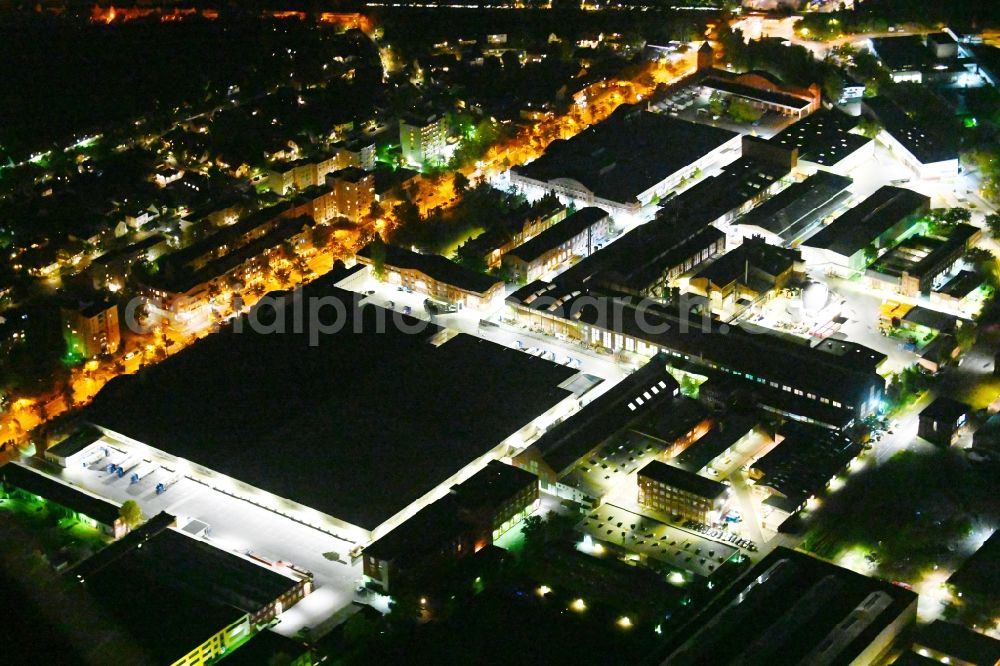 Aerial photograph at night Berlin - Night lighting industrial and commercial area on Eichborndonm in the district Borsigwalde in Berlin, Germany