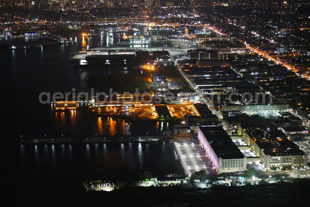 Aerial photograph at night New York - Night lighting Industrial and commercial area Brooklyn Army Terminal on 58th St in the district Brooklyn in New York in United States of America