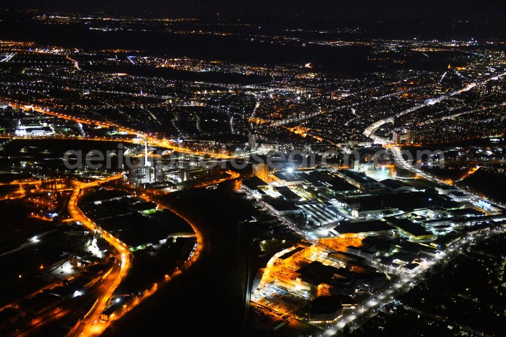 Aerial image at night Karlsruhe - Night lighting industrial and commercial area along the Daxlander Strasse - Pfannkuchstrasse in the district Gruenwinkel in Karlsruhe in the state Baden-Wurttemberg, Germany