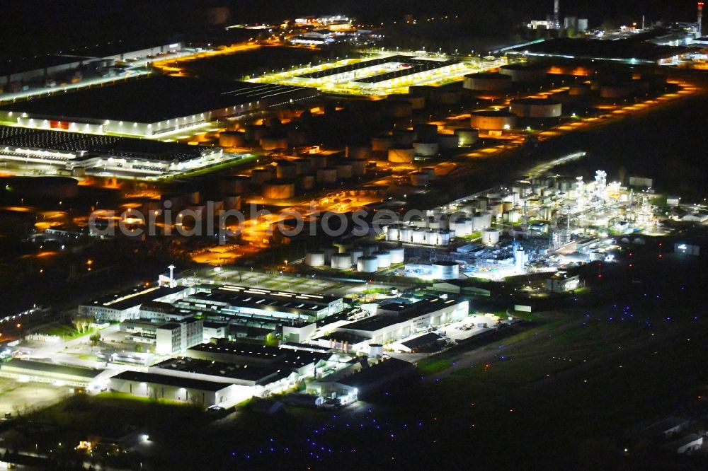 Aerial photograph at night Speyer - Night lighting industrial and commercial area overlooking the work premises of the chemical factory of Haltermann Carless Deutschland GmbH and of the aerospace company PFW Aerospace GmbH in Speyer in the state Rhineland-Palatinate, Germany