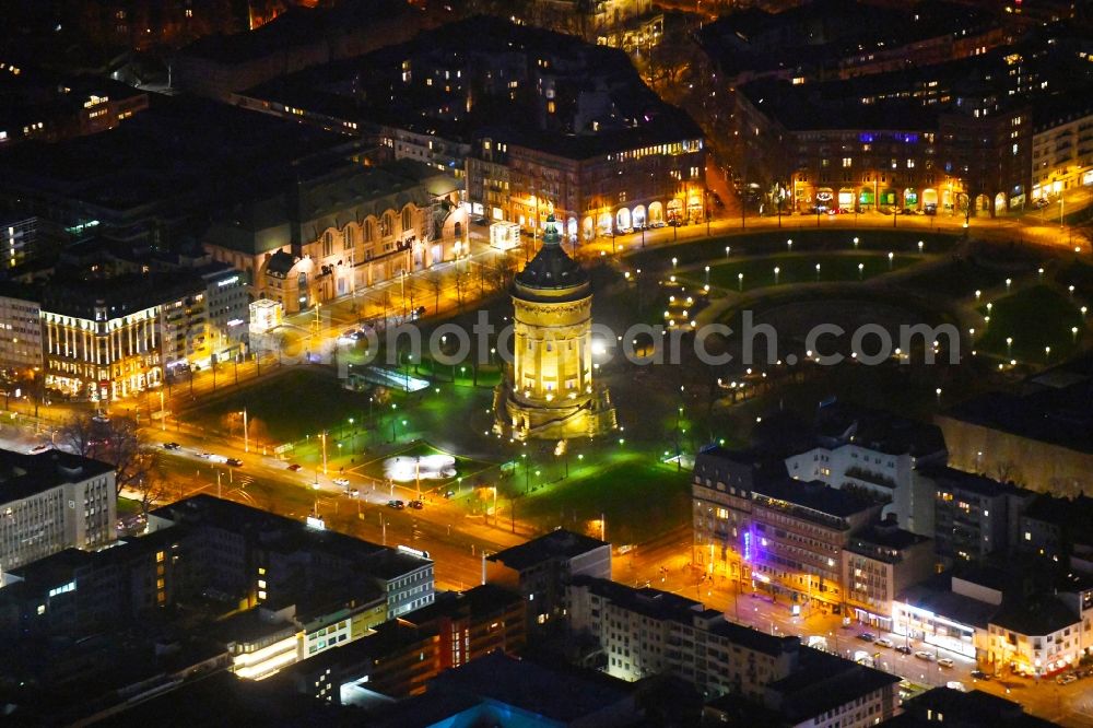 Aerial photograph at night Mannheim - Night lighting building of industrial monument water tower Mannheimer Wasserturm on place Friedrichsplatz in the district Quadrate in Mannheim in the state Baden-Wurttemberg, Germany
