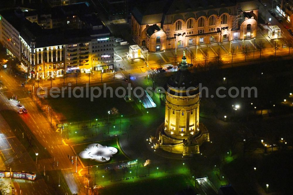 Aerial image at night Mannheim - Night lighting building of industrial monument water tower Mannheimer Wasserturm on place Friedrichsplatz in the district Quadrate in Mannheim in the state Baden-Wurttemberg, Germany