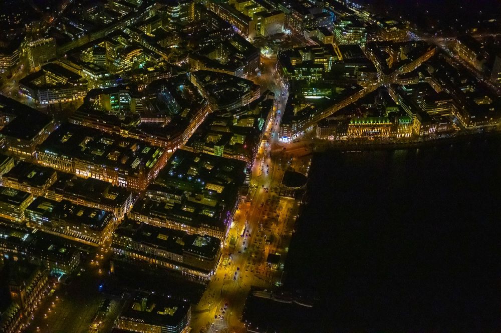Hamburg at night from above - Night lighting city view of the downtown area on the shore areas of Binnenalster Am Jungfernstieg in the district Altstadt in Hamburg, Germany
