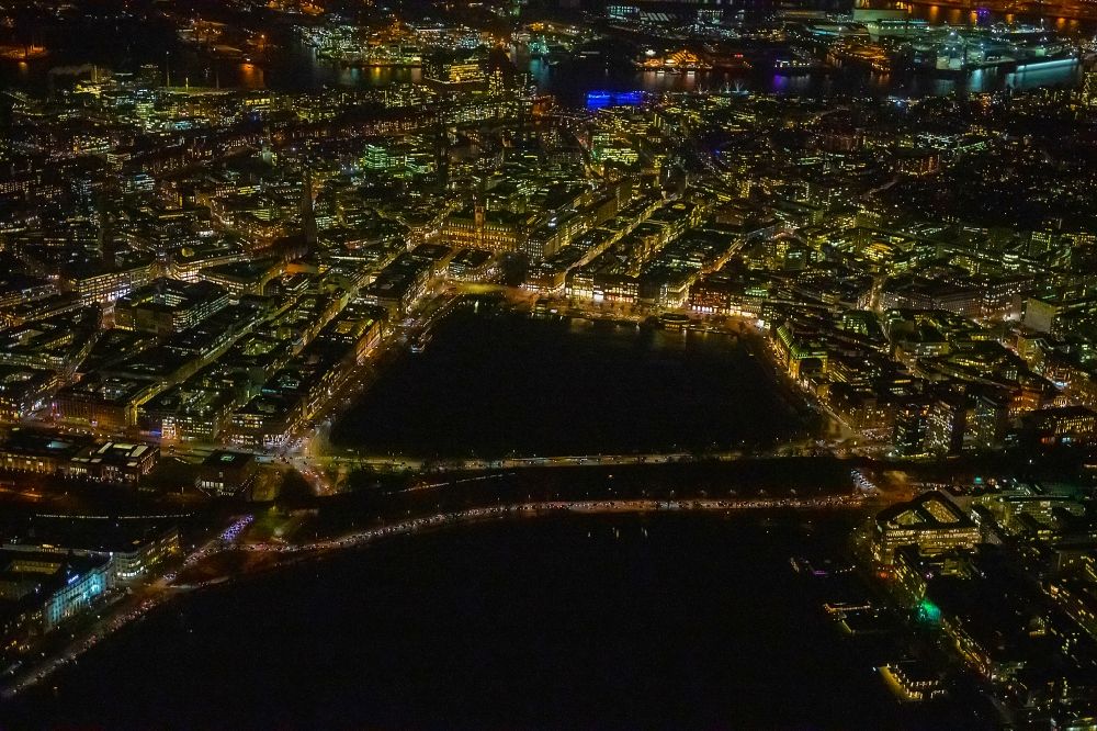 Aerial image at night Hamburg - Night lighting city view of the downtown area on the shore areas of Binnenalster Am Jungfernstieg in the district Altstadt in Hamburg, Germany