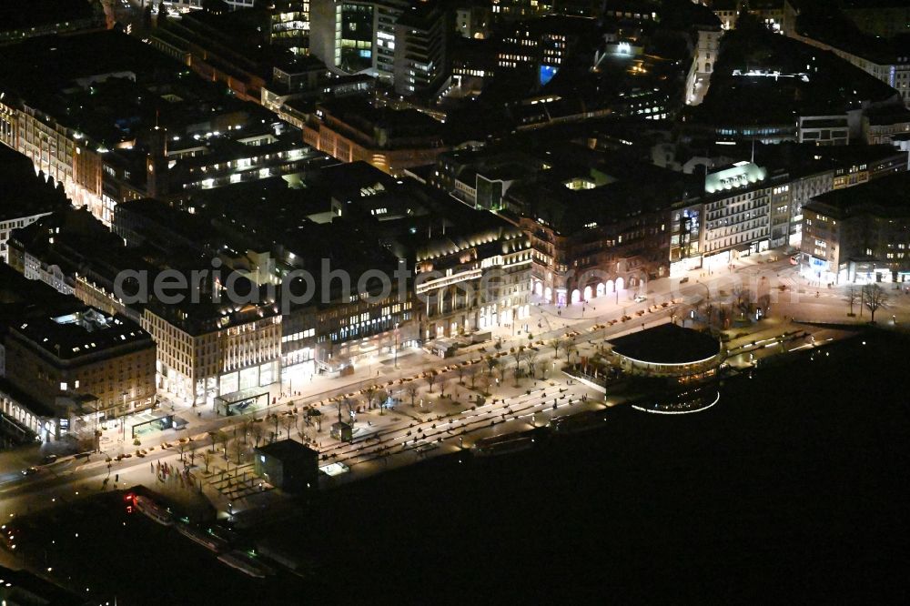 Hamburg at night from the bird perspective: Night lighting city view of the downtown area on the shore areas of Binnenalster Am Jungfernstieg in the district Altstadt in Hamburg, Germany