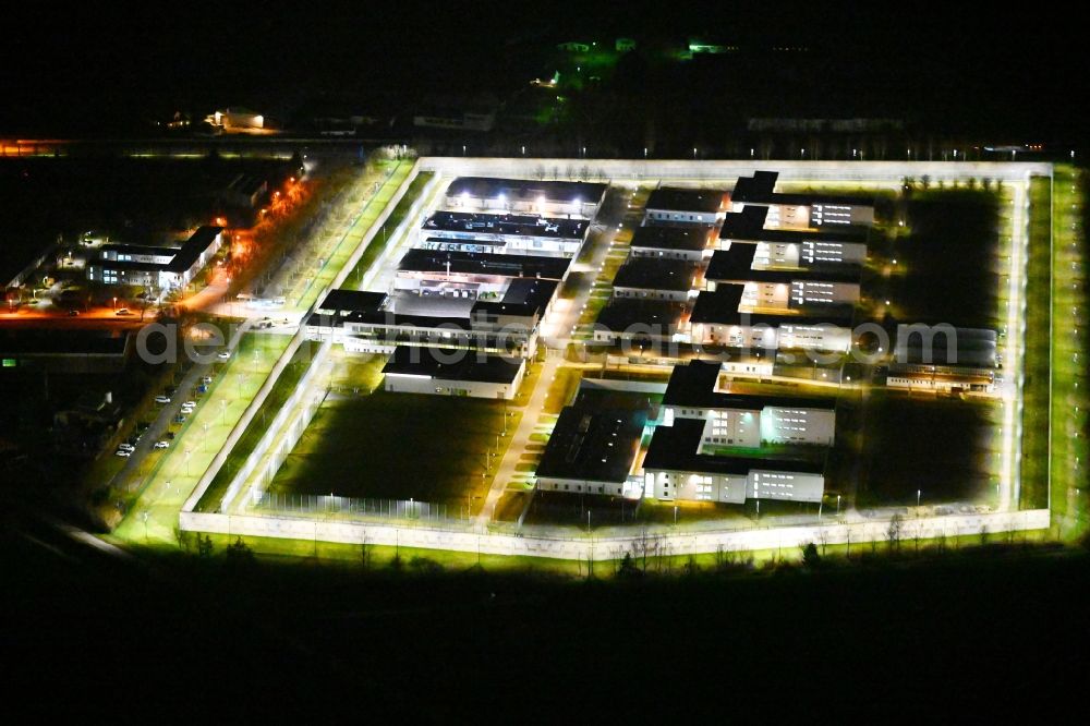 Tonna at night from the bird perspective: Night lighting prison grounds and high security fence Prison in the district Graefentonna in Tonna in the state Thuringia, Germany