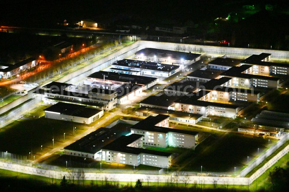 Aerial image at night Tonna - Night lighting prison grounds and high security fence Prison in the district Graefentonna in Tonna in the state Thuringia, Germany