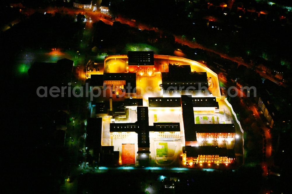 Saarbrücken at night from above - Night lighting prison grounds and high security fence Prison on Lerchesflurweg in Saarbruecken in the state Saarland, Germany