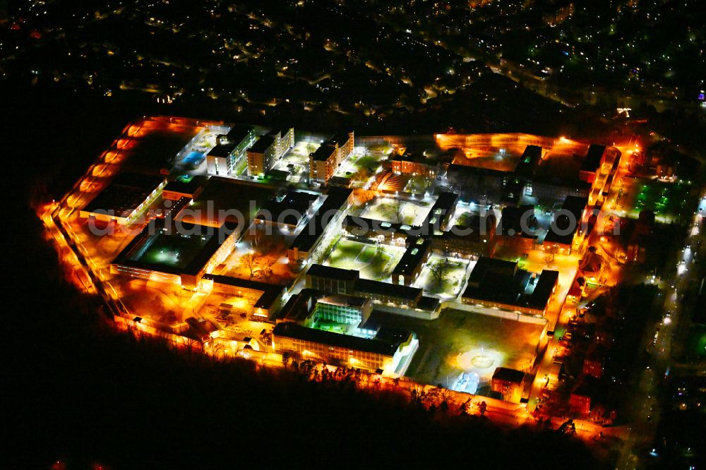 Berlin at night from above - Night lighting prison grounds and high security fence Prison Tegel on Seidelstrasse in the district Reinickendorf in Berlin, Germany