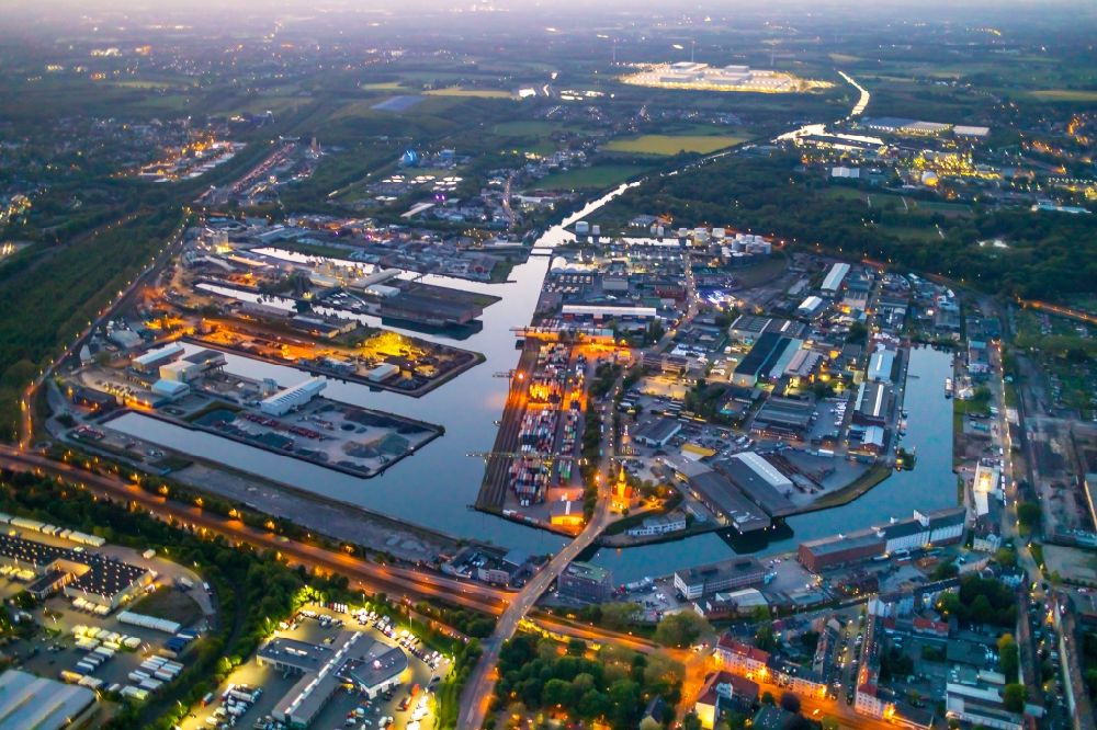 Dortmund at night from above - Night lighting quays and boat moorings at the port of the inland port Dortmunder Hafen AG on Speicherstrasse in Dortmund at Ruhrgebiet in the state North Rhine-Westphalia, Germany