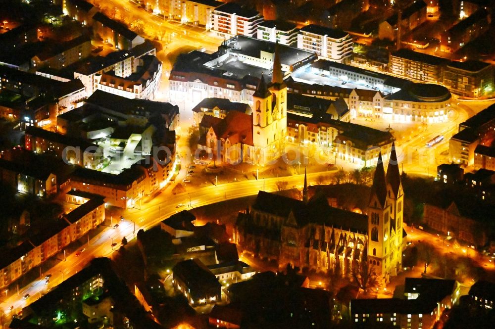 Halberstadt at night from the bird perspective: Night lighting church building of the cathedral and Domschatz in Halberstadt in the state Saxony-Anhalt, Germany