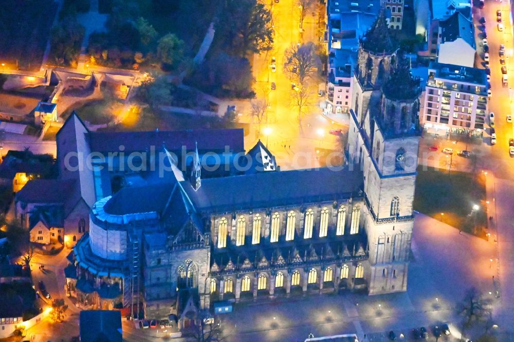 Aerial image at night Magdeburg - Night lighting church building of the cathedral in the district Altstadt in Magdeburg in the state Saxony-Anhalt