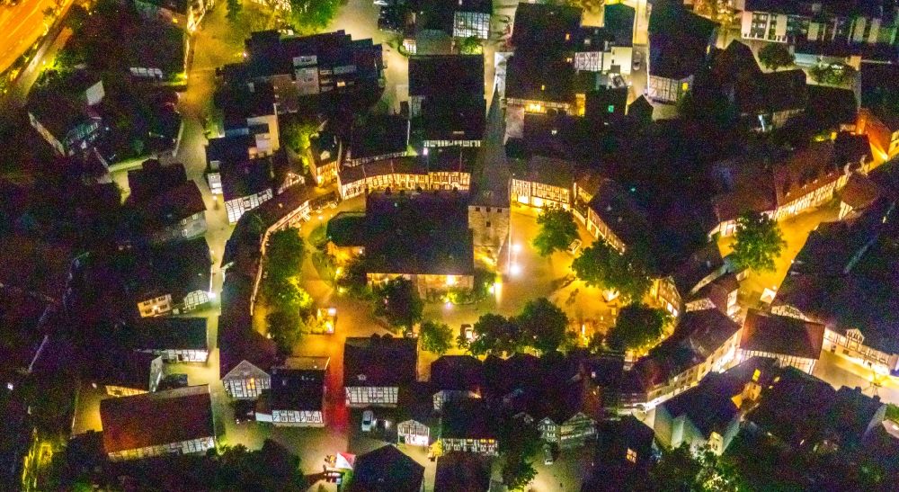 Aerial image at night Hattingen - Night lighting of the church building St. Georg Old Town- center of downtown in Hattingen in the state North Rhine-Westphalia, Germany