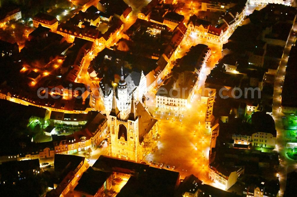 Köthen (Anhalt) at night from the bird perspective: Night lighting church building in St.-Jakobs-Kirche on Marktplatz Old Town- center of downtown in Koethen (Anhalt) in the state Saxony-Anhalt, Germany