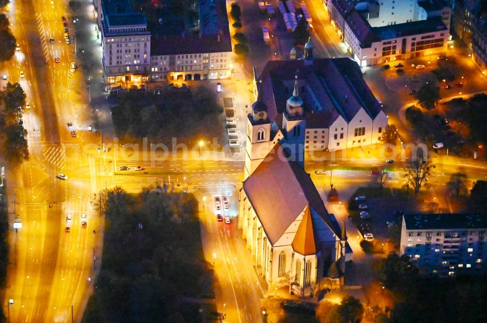 Aerial image at night Magdeburg - Night lighting Church building Johanniskirche on Johannisbergstrasse in the district Altstadt in Magdeburg in the state Saxony-Anhalt