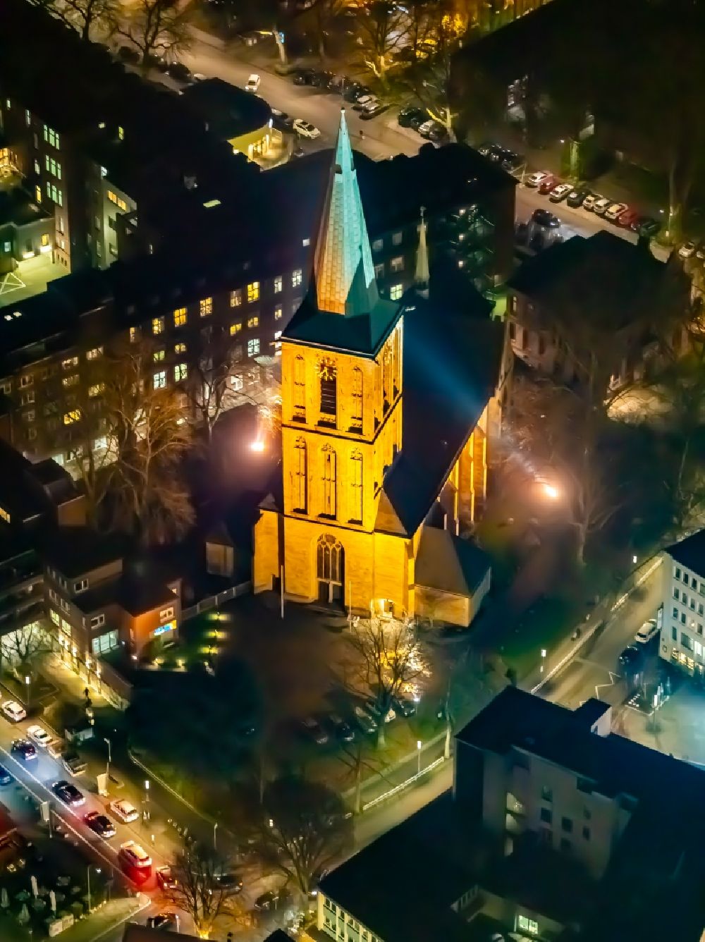 Aerial photograph at night Bochum - Night lighting church building Katholische Propsteikirche St. Peter and Paul in the district Innenstadt in Bochum in the state North Rhine-Westphalia, Germany