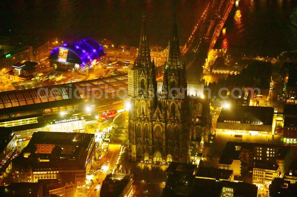 Köln at night from the bird perspective: Night lighting church building Koelner Dom in the old town center in the district Innenstadt in Cologne in the state North Rhine-Westphalia - NRW, Germany