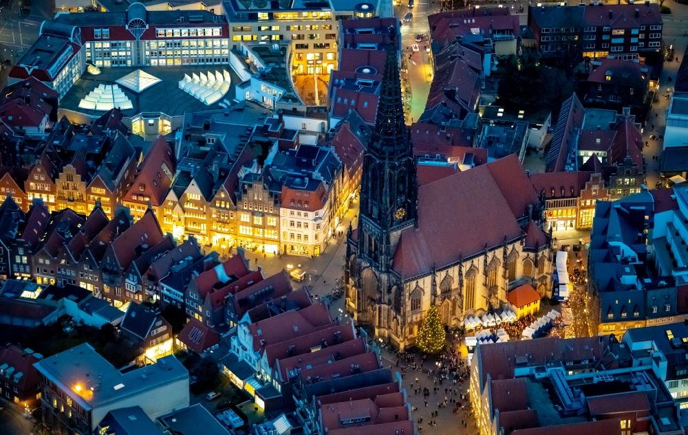 Münster at night from above - Night lighting Church building in St. Lonberti-Kirche on Place Lambertikirchplatz on Old Town- center of downtown in Muenster in the state North Rhine-Westphalia, Germany