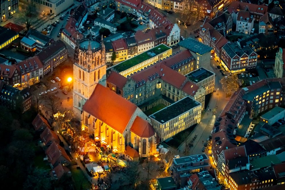 Aerial image at night Münster - Night lighting church building in Liebfrauen-Ueberwasserkirche Old Town- center of downtown in Muenster in the state North Rhine-Westphalia, Germany