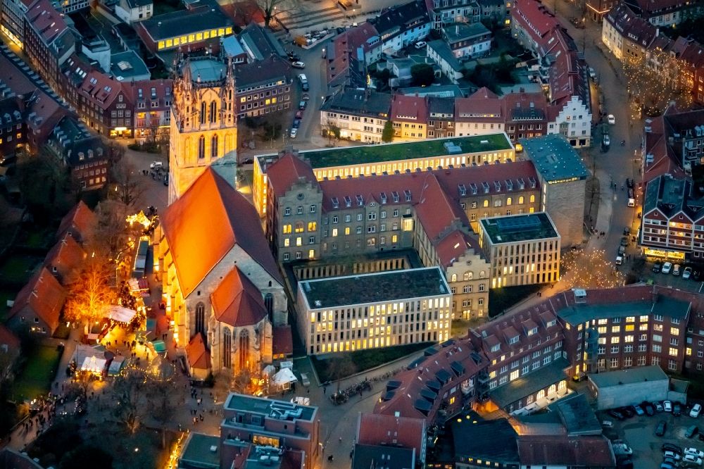 Münster at night from above - Night lighting church building in Liebfrauen-Ueberwasserkirche Old Town- center of downtown in Muenster in the state North Rhine-Westphalia, Germany