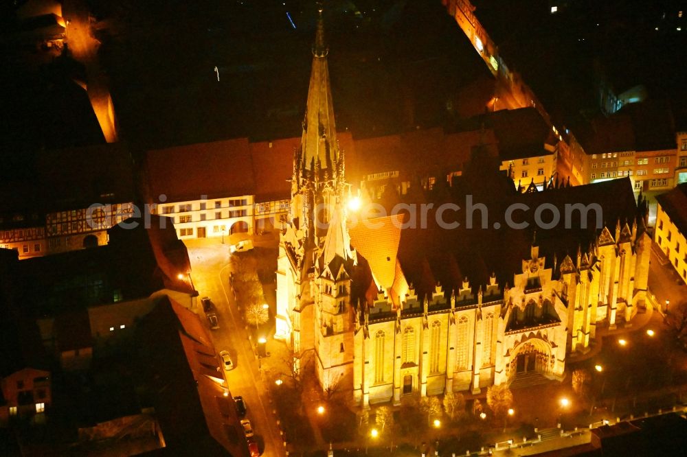 Mühlhausen at night from the bird perspective: Night lighting church building in of Marienkirche Old Town- center of downtown in Muehlhausen in the state Thuringia, Germany