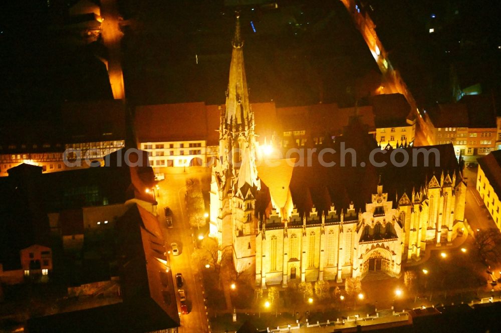 Aerial photograph at night Mühlhausen - Night lighting church building in of Marienkirche Old Town- center of downtown in Muehlhausen in the state Thuringia, Germany