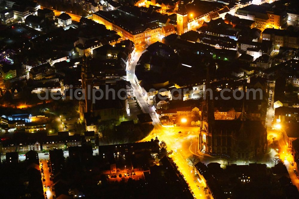 Aerial photograph at night Speyer - Night lighting church building of the Gedaechtniskirche der Protestation and the Sankt-Josephs-Kirche in the village of in Speyer in the state Rhineland-Palatinate, Germany